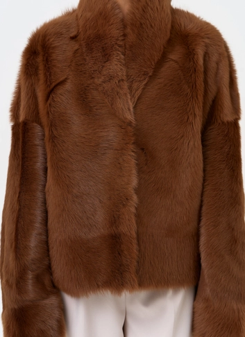 Яркая натуральная дубленка фото